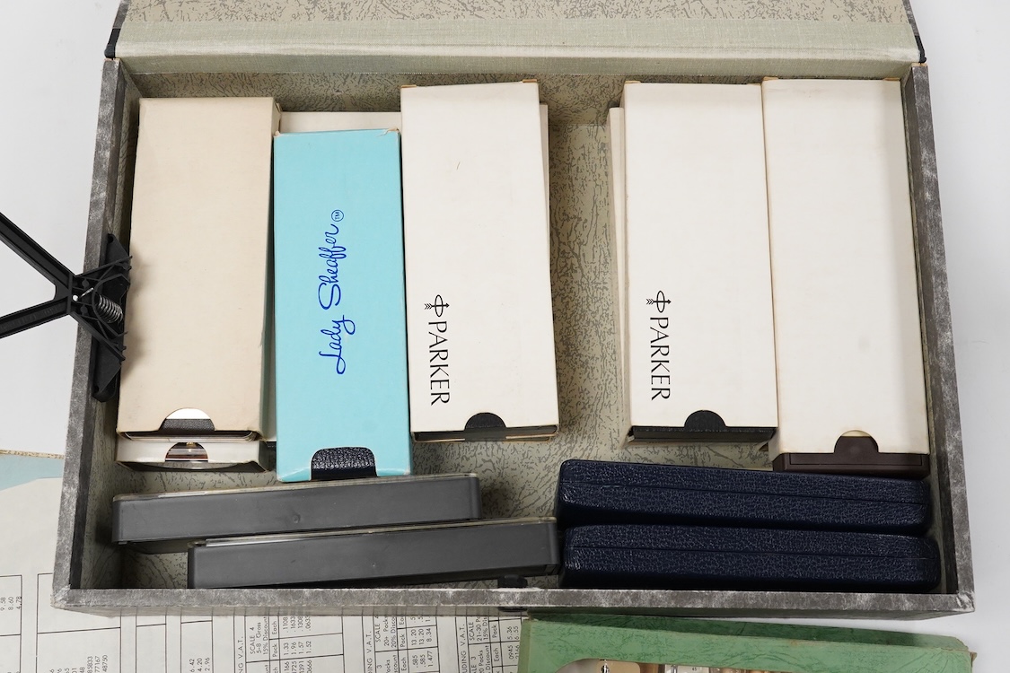 A folder of Parker and Sheaffer pens and ball pens, mostly boxed and a Parker Pen box containing eight items